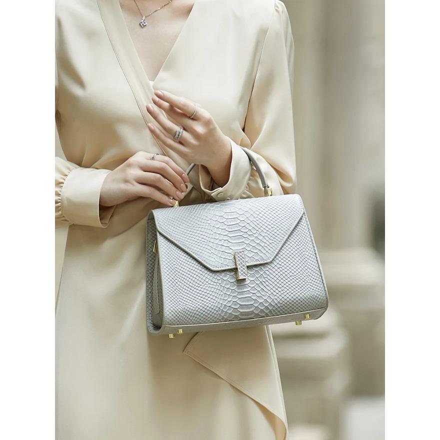 

Ограниченная серия Сумка через плечо из натуральной кожи с узором «Серпантин» для женщин Деловая сумка Черные сумки