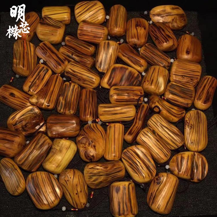 Tiger Stripe Cypress Wood Carved Pendant
