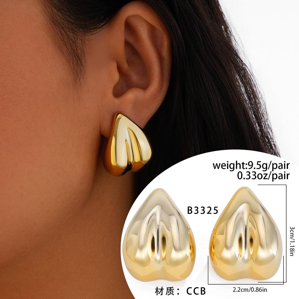 Street shots ins geometric metal earrings earrings design glossy surface comma water drop stud earrings female
