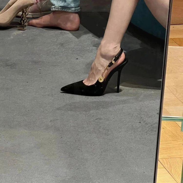 Black rhinestone high heels women's 2025 new pointed thin heel metal one-word buckle celebrity banquet bag head sandals