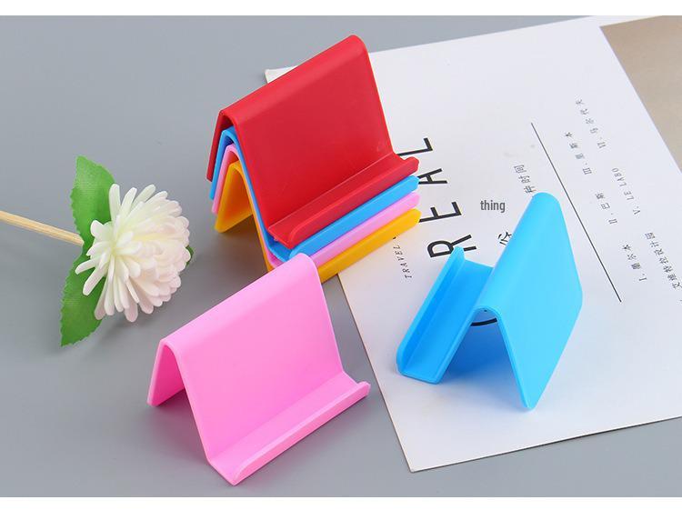 

Portable Multifunctional Phone & Tablet Stand - Simple, Compact Holder for Watching Dramas on Any Desktop 3000 per box
