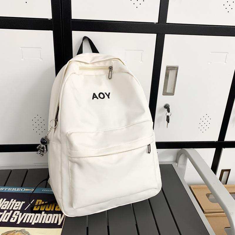 Backpack women's new Korean version Harajuku college student schoolbag student backpack simple solid color large capacity backpack