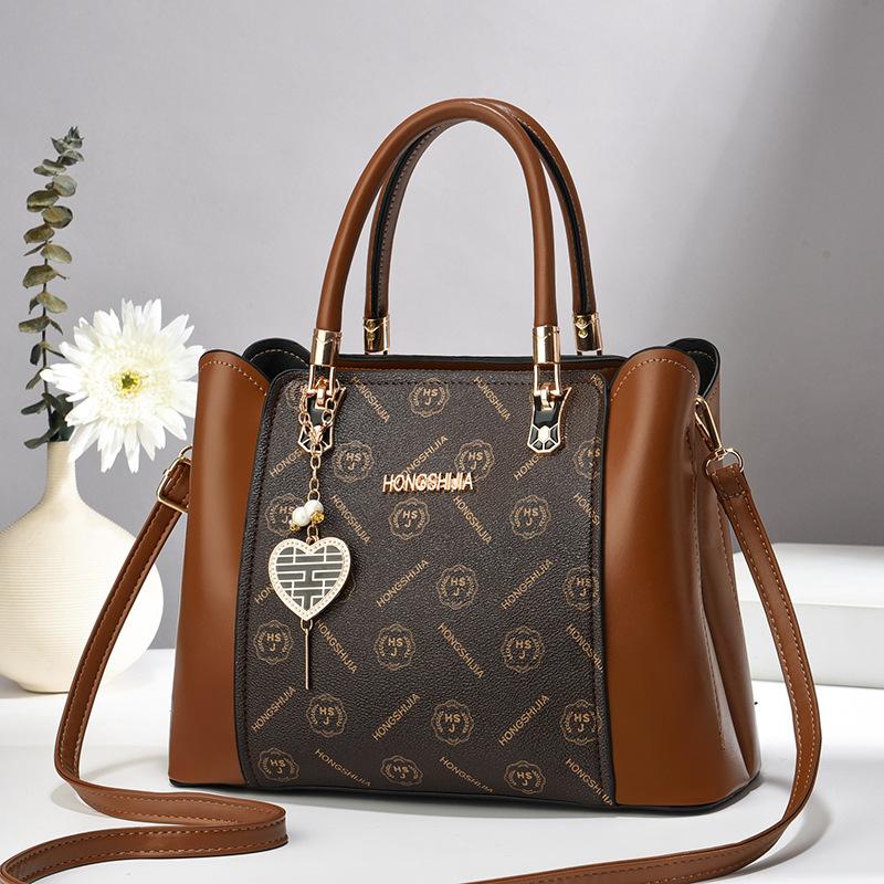 

2025 новая популярная женская сумка большой вместимости текстурированная с цветочным принтом контрастного цвета на плечо портативная модная сумка