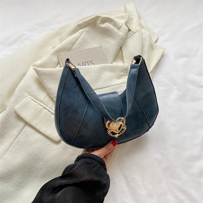 

Casual commuter armpit bag 2024 autumn new bag women s retro personalized handbag fashionable and simple shoulder bag синій