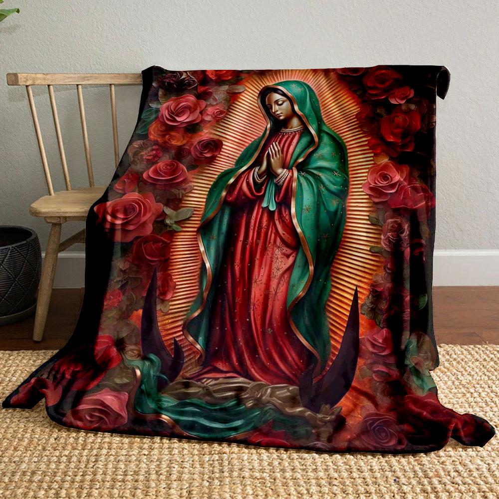 A religious figure with a radiant backdrop, surrounded by red roses. for all seasons blanket lunch break throw gift