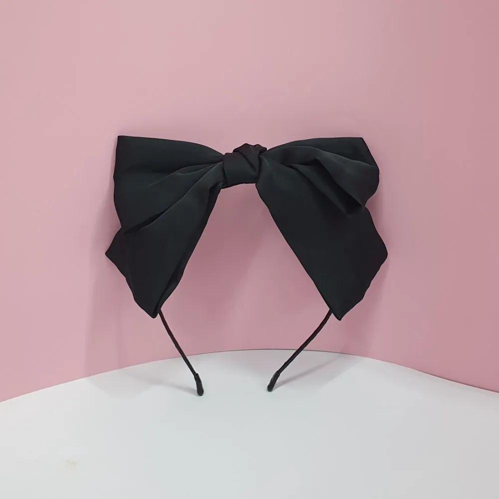 Styling black oversized ribbon hair headband