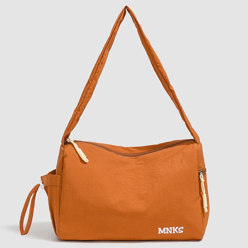 

Summer new foreign style texture simple large-capacity bag 2025 fashion trend casual women s shoulder tote bag помаранчевий