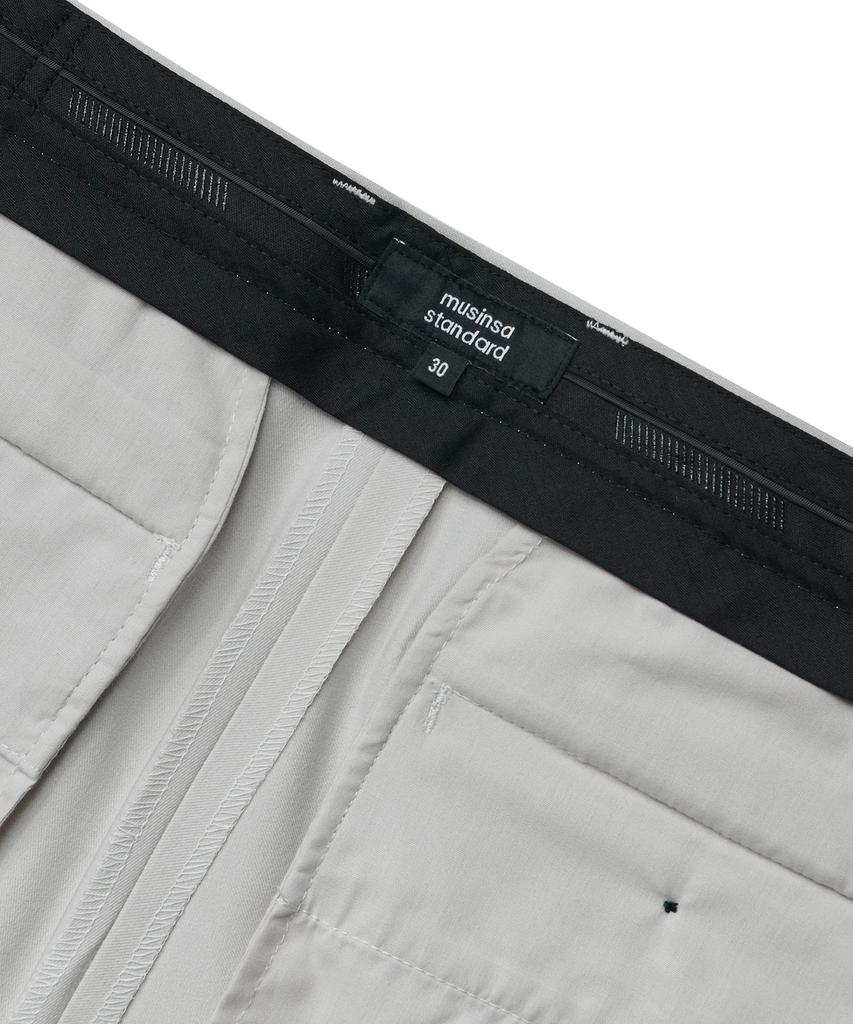 MUSINSA STANDARD Relaxed Tapered Hidden Banding Crop Slacks [Dusty Cream]