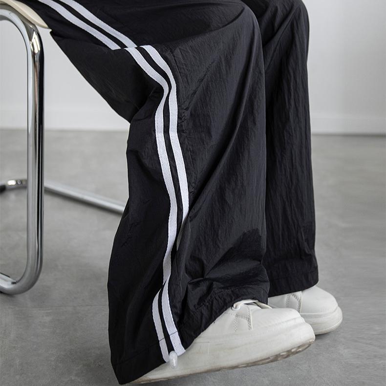 Szybkoschnące amerykańskie proste spodnie sportowe damskie letnie spodnie dresowe uniwersalne spodnie w paski szerokie nogawki wyszczuplające spodnie casualowe