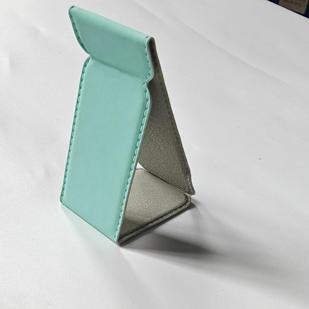 Universal PU Leather Phone Stand: Magnetic, Stick-On Holder for Foldable Android, Apple, and Huawei Devices