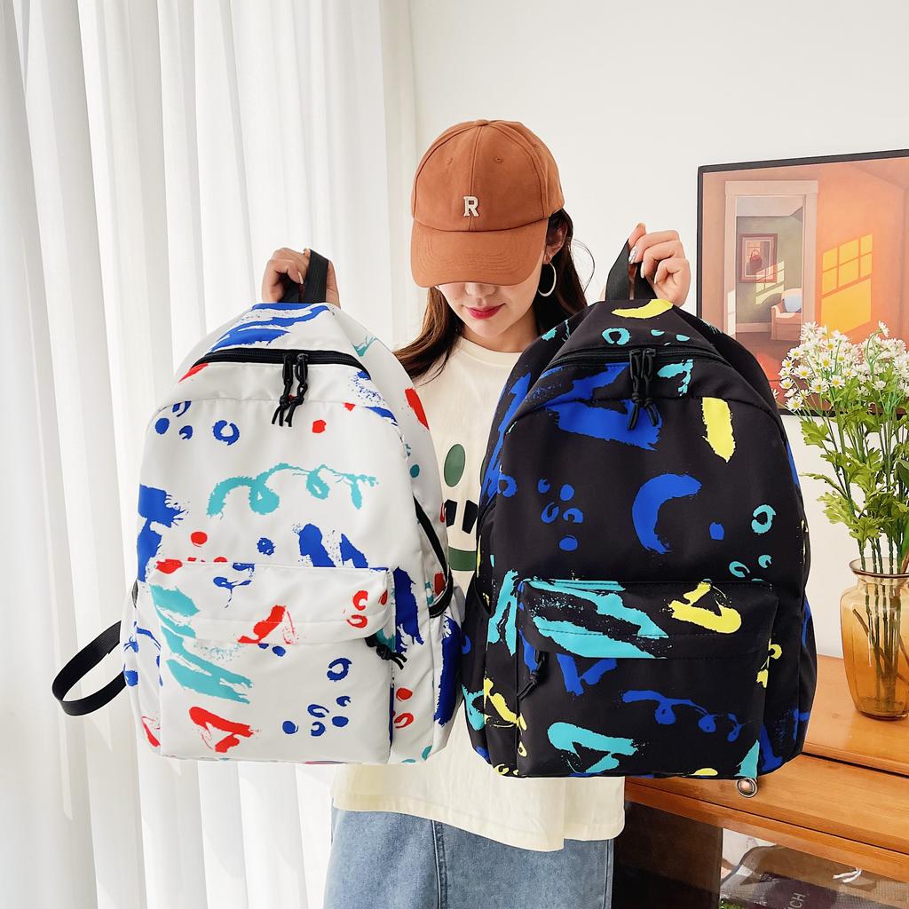 Schultasche Lässige Graffiti-Schultasche Neue koreanische Version für Herren ins Style vielseitiger Rucksack für Grundschüler Mittelschüler Harajuku