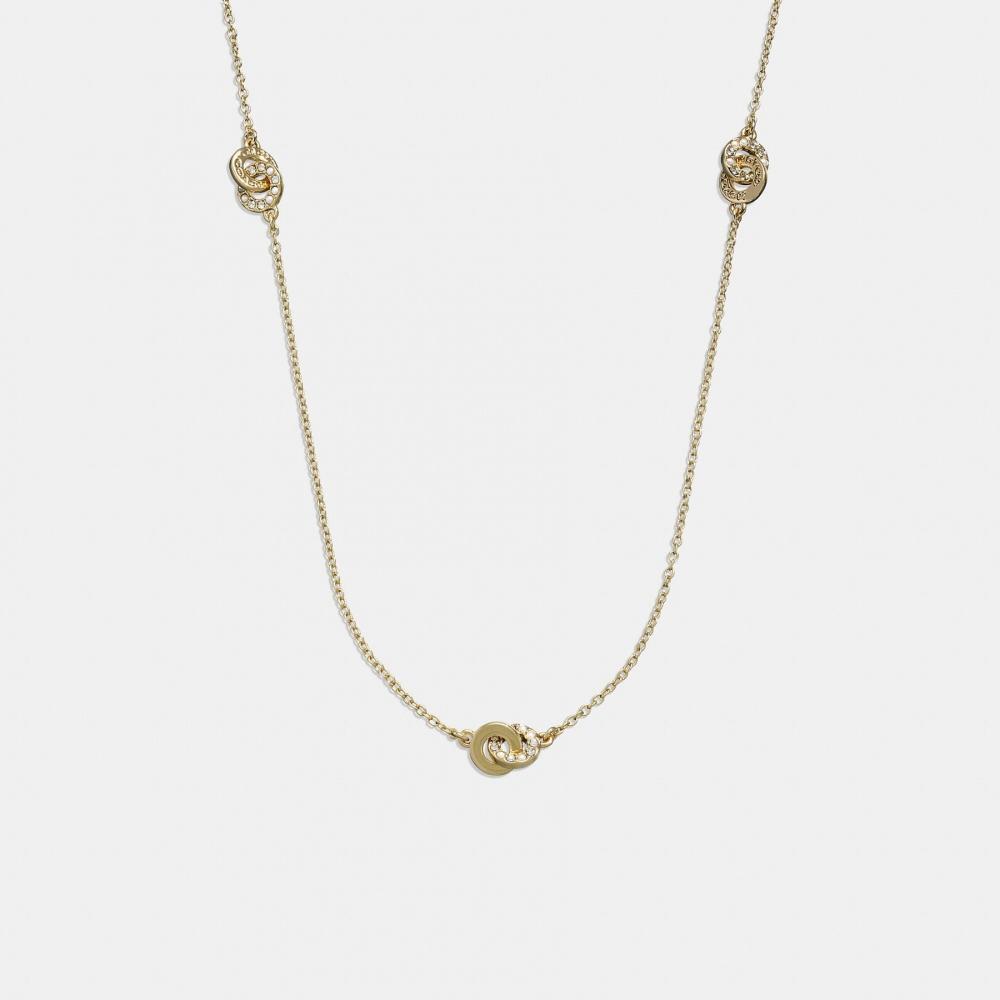 

Длинное колье Coach с переплетением открытого круга и жемчугом