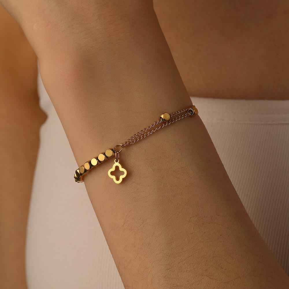 Double Layer Titanium Steel Four-Leaf Clover Bracelet with Flower Pendant