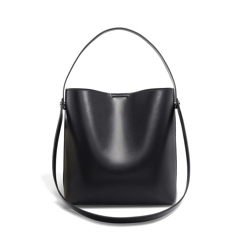 

Новая кожаная модная нишевая дизайнерская сумочка, коровья кожа, большая вместимость, сумка-ведро через плечо для通勤 чёрный