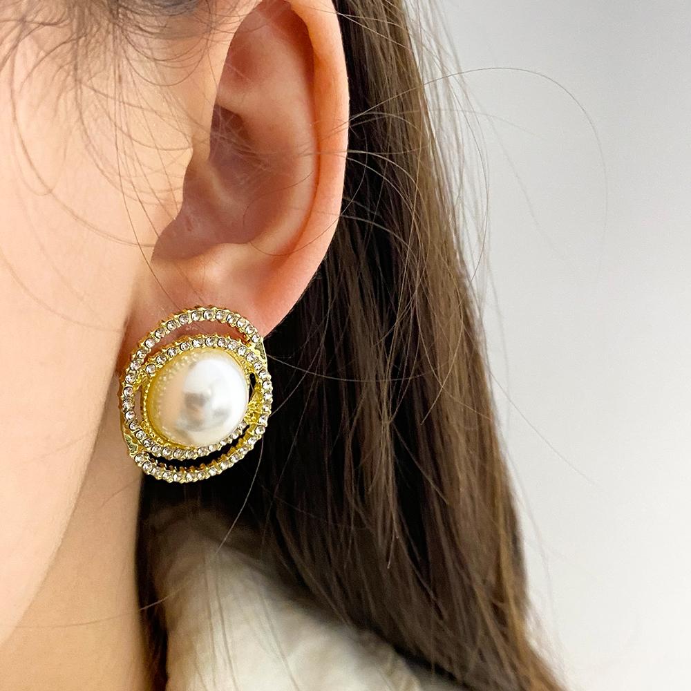 Boucles d'oreilles élégantes de couleur or pour femmes, tempérament blanc, boucles d'oreilles irrégulières, bijoux tendance, cadeaux