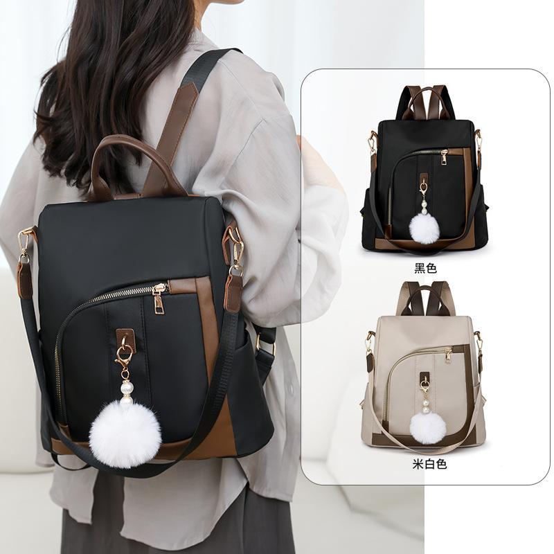 Backpack women's new simple contrasting color commuter casual backpack large capacity anti-theft women's travel bag