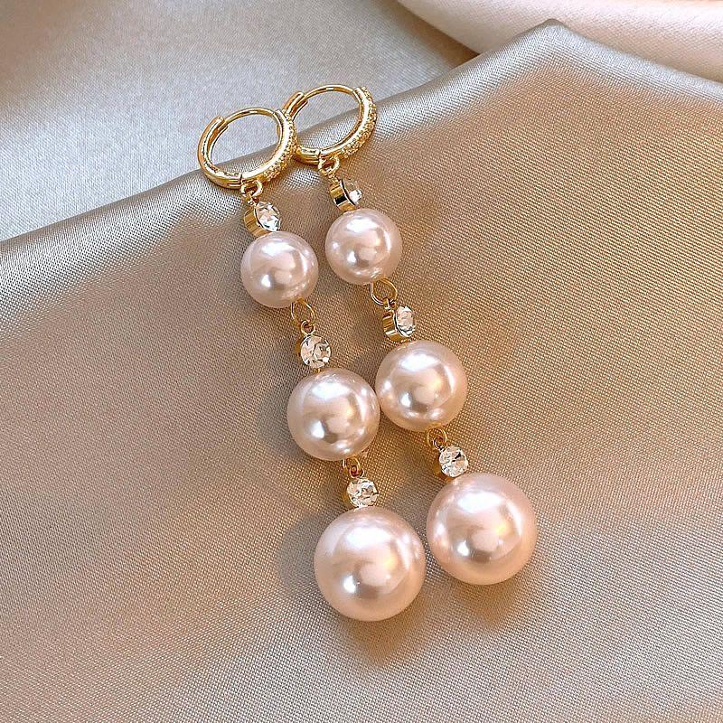 

Нишевый стиль Тань Сунъюнь Тот же стиль Женский Причудливый Уникальный Жемчуг Diamond-encrusted pearl Long tassel