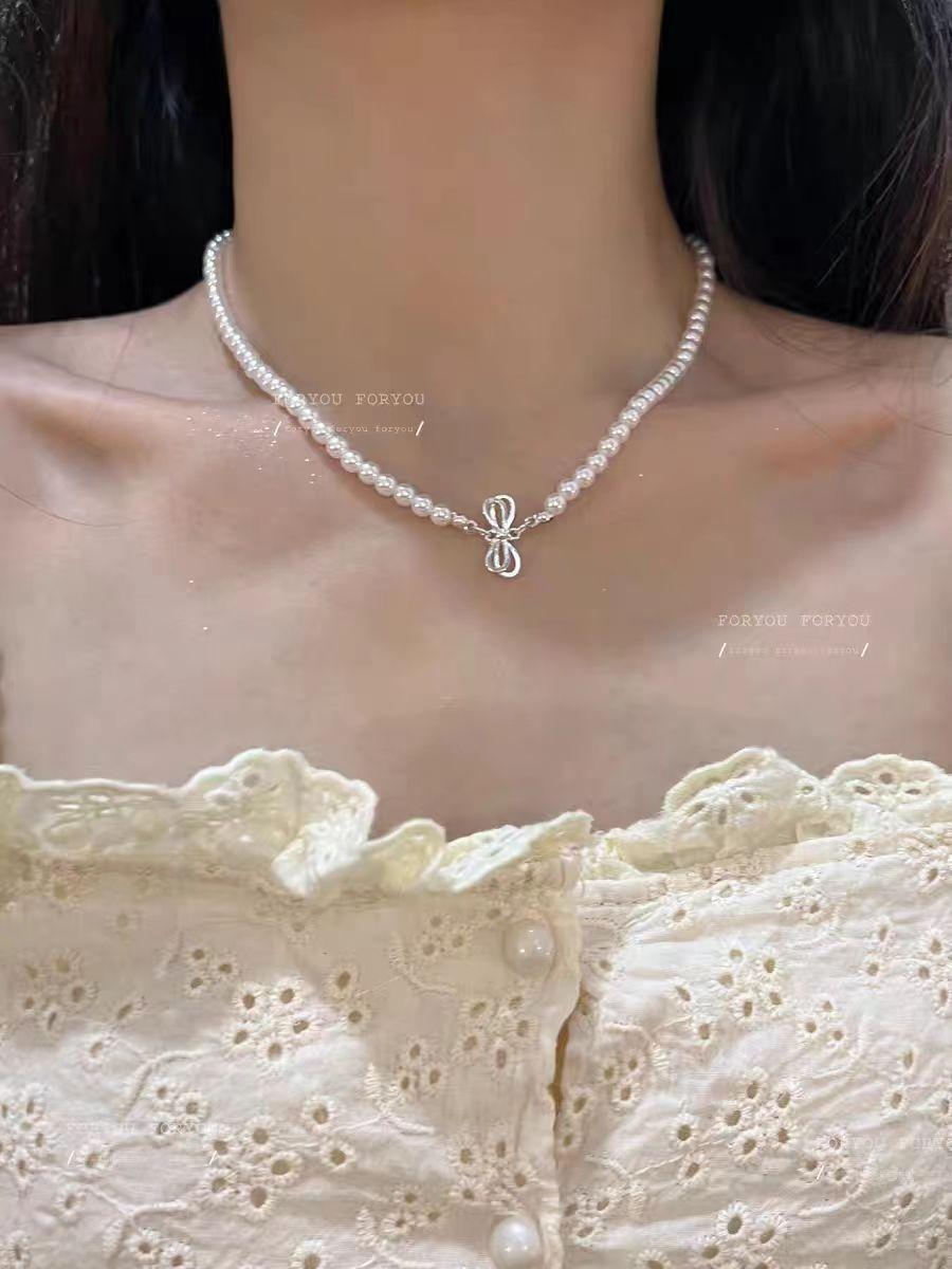 

Pearl necklace women s spring new pendant neck chain light luxury niche high-end collarbone chain