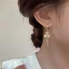 New Light Luxury Three Leaf Clover Ear Buckle with Advanced Sense Cat Eye Stone Tassel Unique Four Leaf Clover Earrings