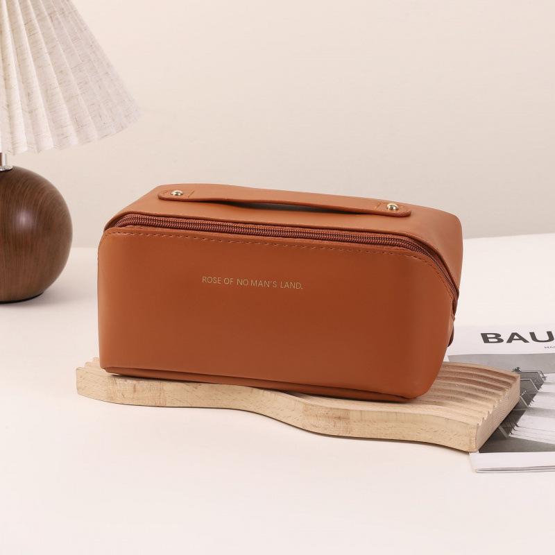 Kosmetiktasche mit großer Kapazität, Kosmetiktasche aus Leder für Damen, multifunktionale Toilettenartikel, tragbare wasserdichte Aufbewahrungsbox für Reisen.