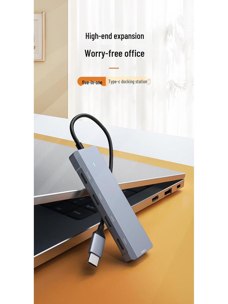 Type-C Five-in-One Hub: PD100W Fast Charging with USB3.0/Type-C Expansion.