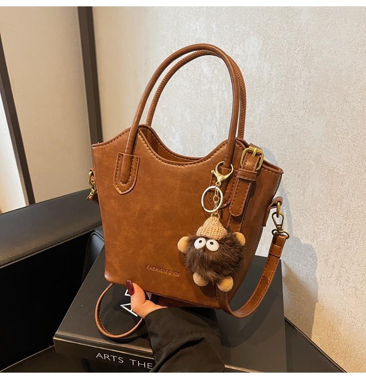 

Популярная ретро сумка женская осенне-зимняя универсальная 2024 новая сумка-мессенджер премиум-сумка-ведро кофейный