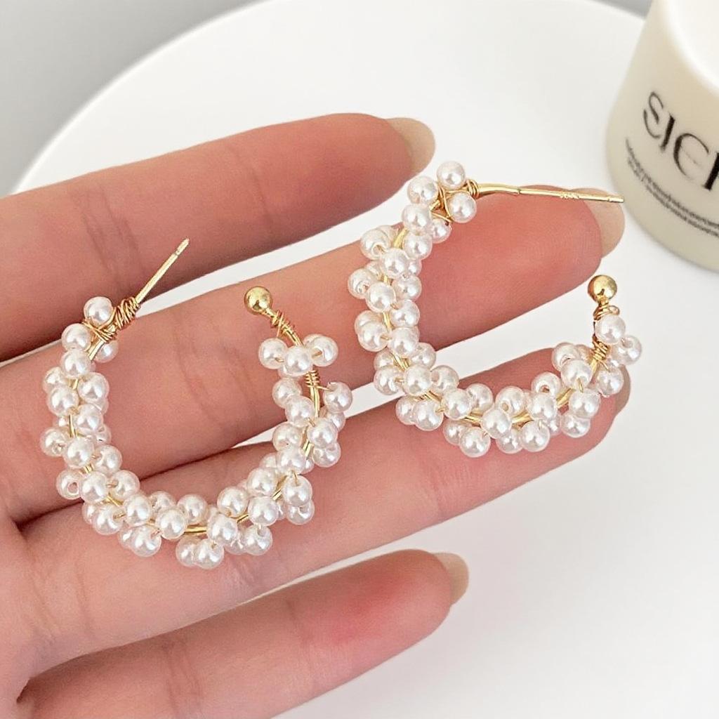 C-type bright pearl earrings cold wind high sense light luxury stud earrings temperament design sense personality niche earrings women