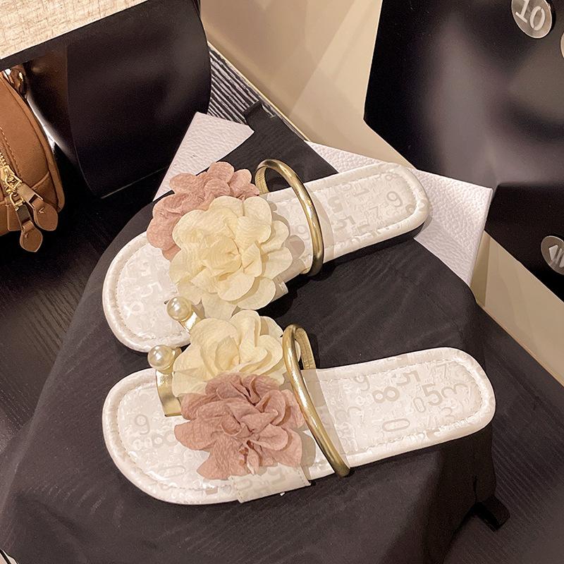 2025 summer new open-toed flower casual beach women's cool slippers low-heeled flat bottom women's high-end sense