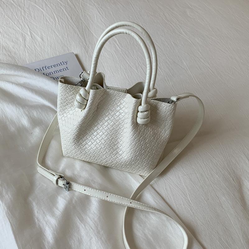 

Fashion portable small bag women s 2025 new retro texture bucket bag foreign style casual woven shoulder messenger bag білий