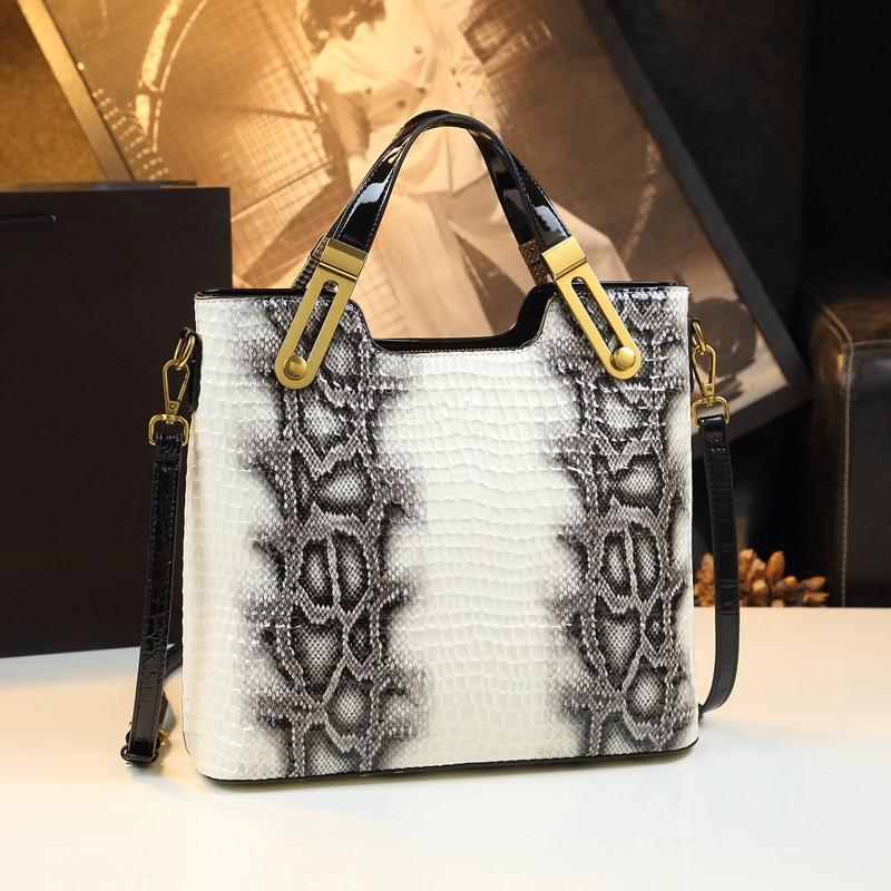 

Роскошная мода Змеиный узор Женские сумки Новая натуральная кожа Большая вместимость Мама Сумка через плечо Мессенджер Портативные сумки-тоут