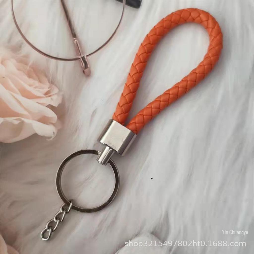 Gevlochten Lederen Touw Sleutelhanger met Poppenhanger - Modieus en Creatief Accessoire