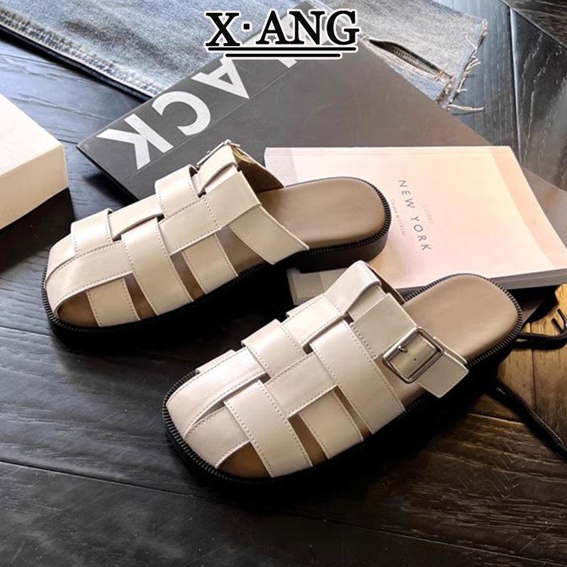 Cowhide version soft-soled bag head half slippers women's summer wear 2025 new woven hollow pig cage shoes Roman sandals women