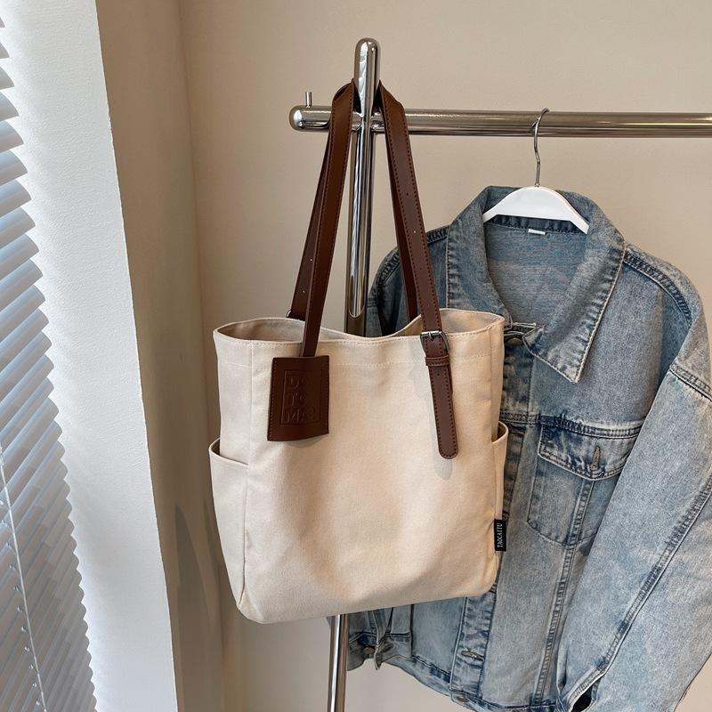 Niche shoulder bag commuter large capacity 2025 new casual aesthetic bag female college student class tote bag