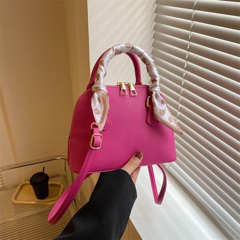 

Trendy Pink Shell Bag For Women Featuring Soft Material And Chic Design Perfect For Daily Use маджента