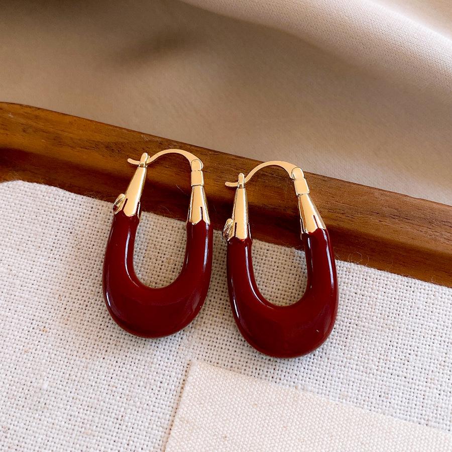 European and American retro Hong Kong style dripping oil U-shaped earrings, ear buckles, temperament earrings, design sense niche