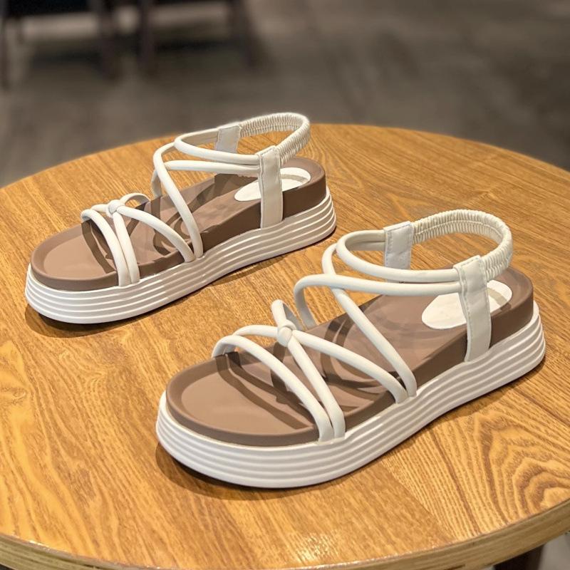 Roman sandals women 2025 new summer fairy wind wear heightened foot cover seaside beach shoes women thick soles non-slip