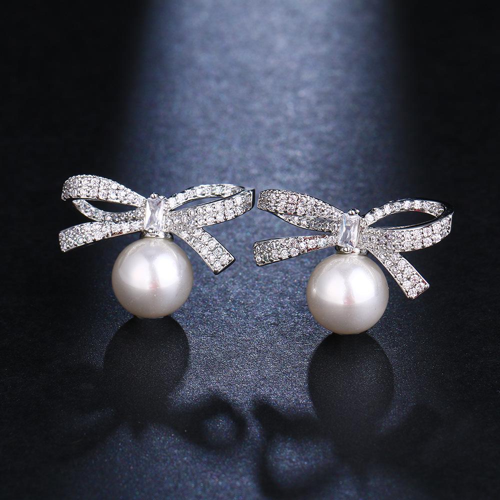 

Серьги-бантики с жемчугом и цирконом, инкрустированные бриллиантами - Элегантная и универсальная модная бижутерия для женщин