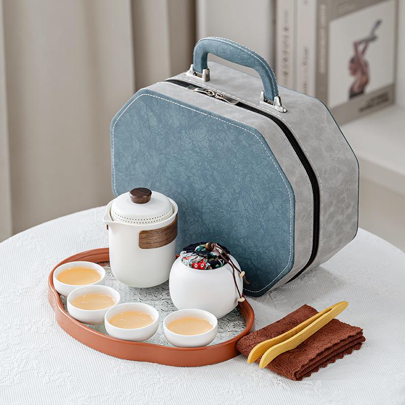 Chinese retro minimalist Dehua coarse pottery Lingxue pot portable four cups outdoor travel tea set business trip souvenir