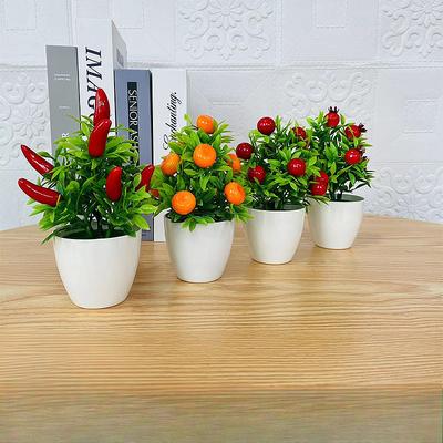 9 Chili and Orange Artificial Potted PlantsArtificial Fruit Small Potted Plantsand A Table with A Money Tree