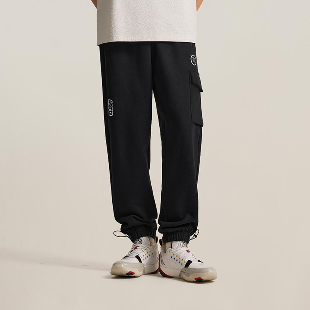 Li Ning Wow Wade Series Devil Fish Fleece Warm Loose Skin-Friendly Soft Comfortable Letter Pattern Lace-Up Knitted Sports Pants Men Pants AKLV785-1