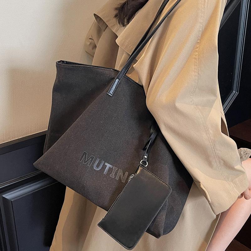 Fashion commuter canvas bag women's new simple portable commuter retro shoulder bag large capacity student tote bag
