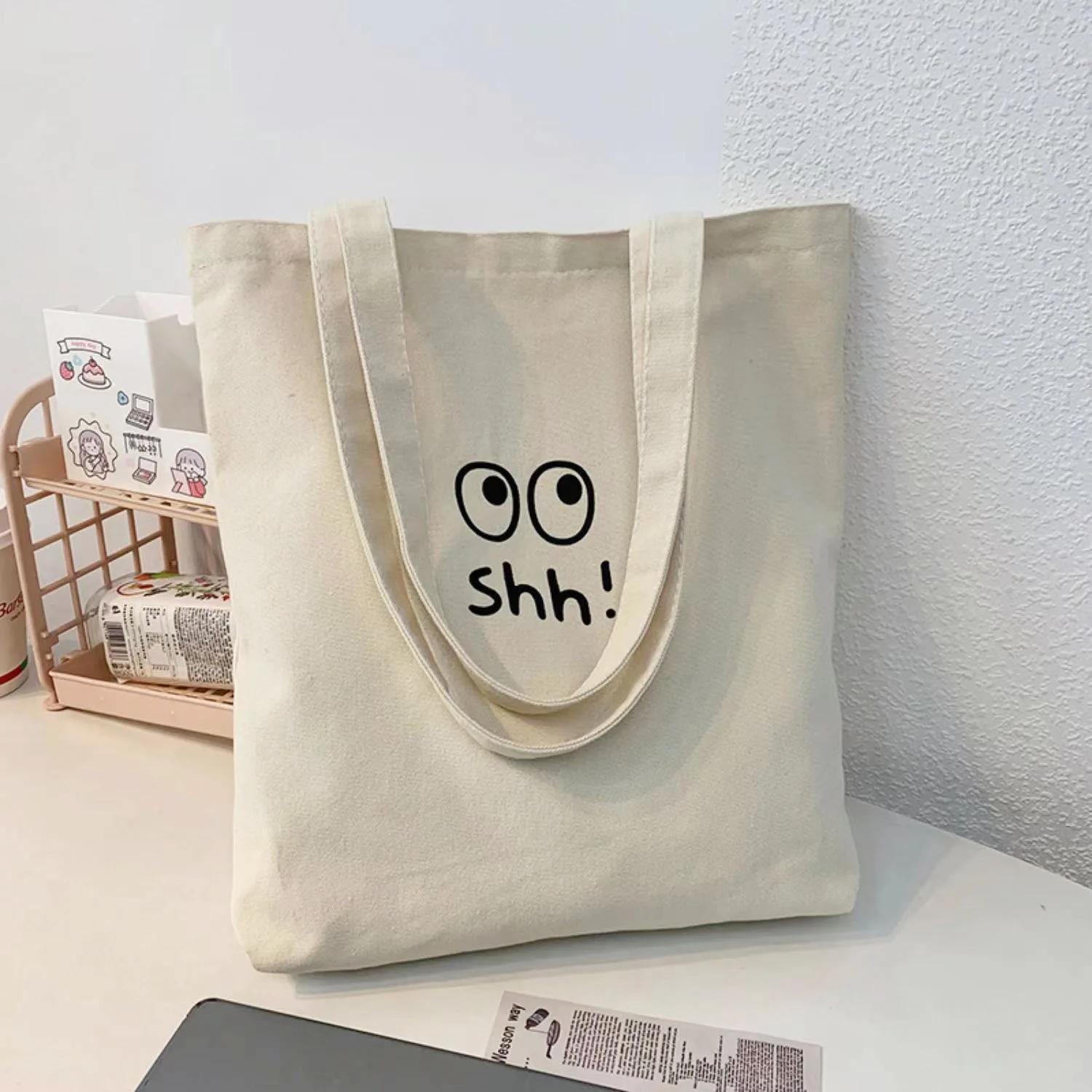 

New lazy style ins versatile, casual simple solid color carto big eyes shh! Printed hand carry shoulder bag envirmentally fr бежевый