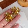 European and American light luxury high-end metal flower earrings, beautiful temperament exaggerated unique design retro high-end stud earrings