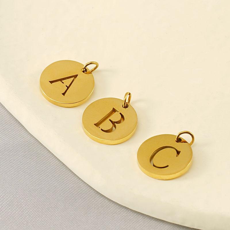 New titanium steel English letter DIY pendant fashionable stainless steel round hollow letter pendant