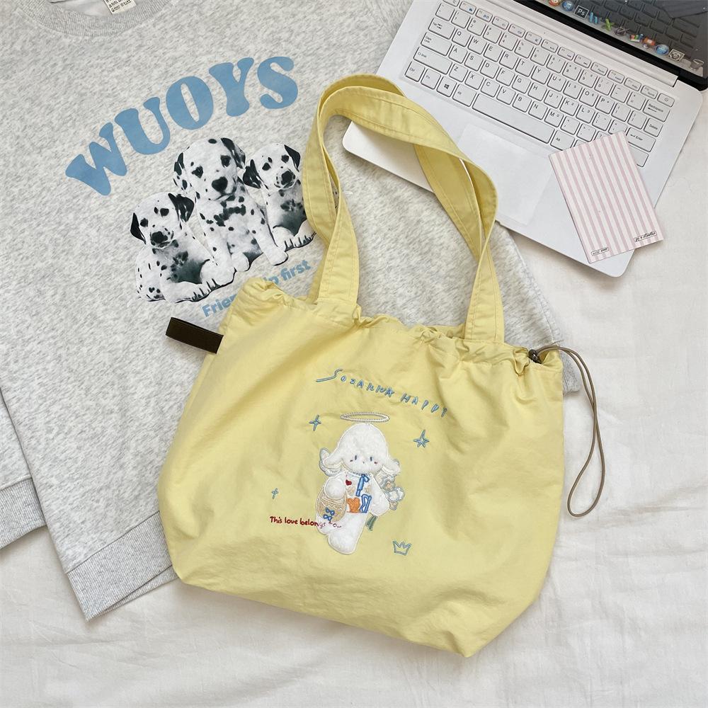 Canvas bag Large capacity women's embroidery lamb fabric bag Simple versatile drawstring bundle shoulder bag