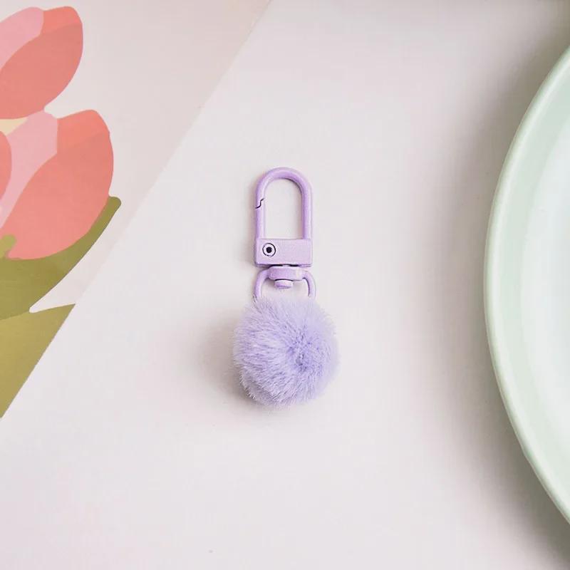 Colorful Milk Pendant Plush Ball Keychain with Macaron Shade and Revolving Buckle.