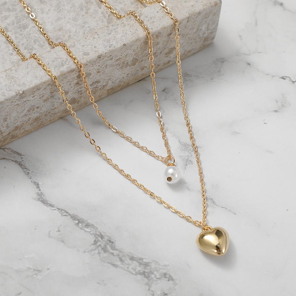 2025 new simple retro creative lady, wind multi-layer pearl love necklace
