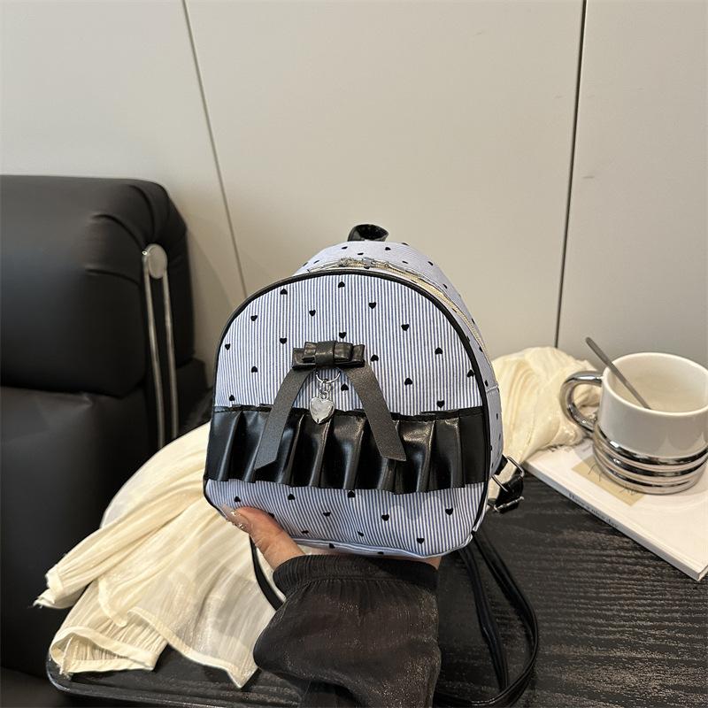 

Korean girl bow backpack bag women 2025 new fashion cute polka dot small backpack versatile handbag синій