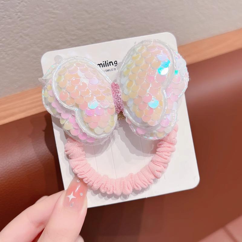 

Детская резинка для волос с пайетками в виде бабочки не повредит волосы. Идеально подходит для высоких хвостов или в качестве головного убора для девочек. Butterfly белый