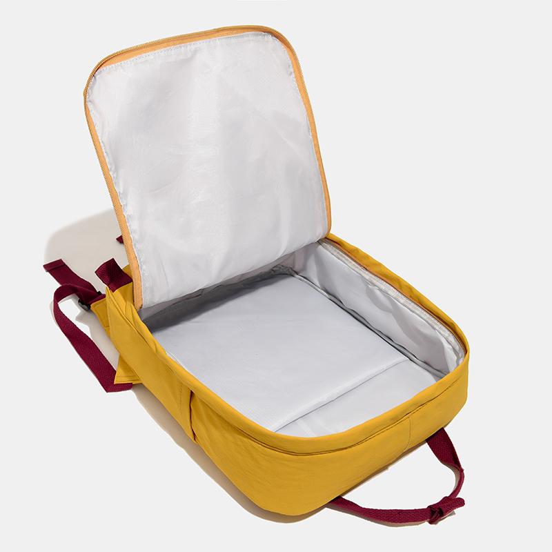 Farbblock-Rucksack mit Fronttasche und gepolsterten Schultergurten